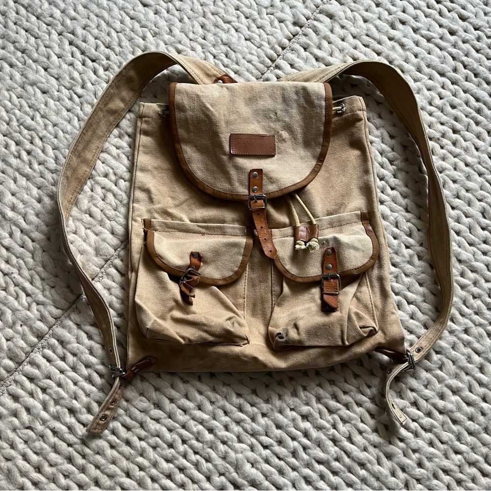 Distressed World Famous Tan Canvas Backpack